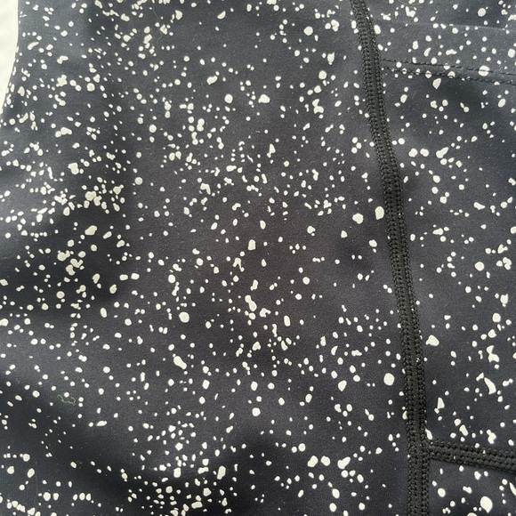 Zyia Speckled reflective Leggings in Black and silver. They are 3/4 length. - Picture 3 of 4